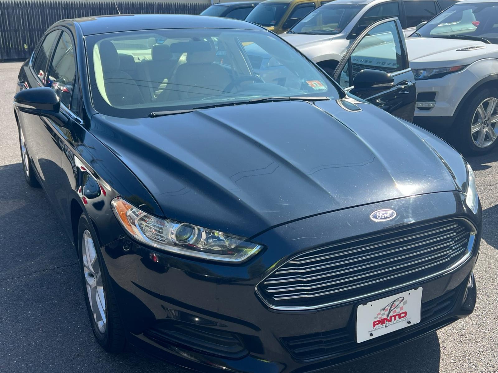 2016 BLACK /Beige Ford Fusion (3FA6P0H78GR) , located at 1018 Brunswick Ave, Trenton, NJ, 08638, (609) 989-0900, 40.240086, -74.748085 - Just Arrived! 2016 Ford Fusion | Loaded up | Just Serviced | $8,995 | Call Now! This Vehicle will not last long!!! Pinto Auto Group PintoAutoGroup.com 609-989-0900 - Photo #12